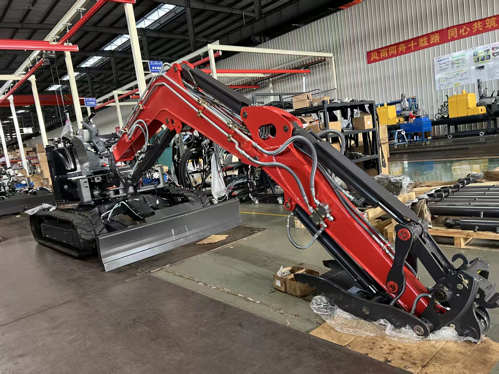 Excavator components staged in the TOUGHNEER factory