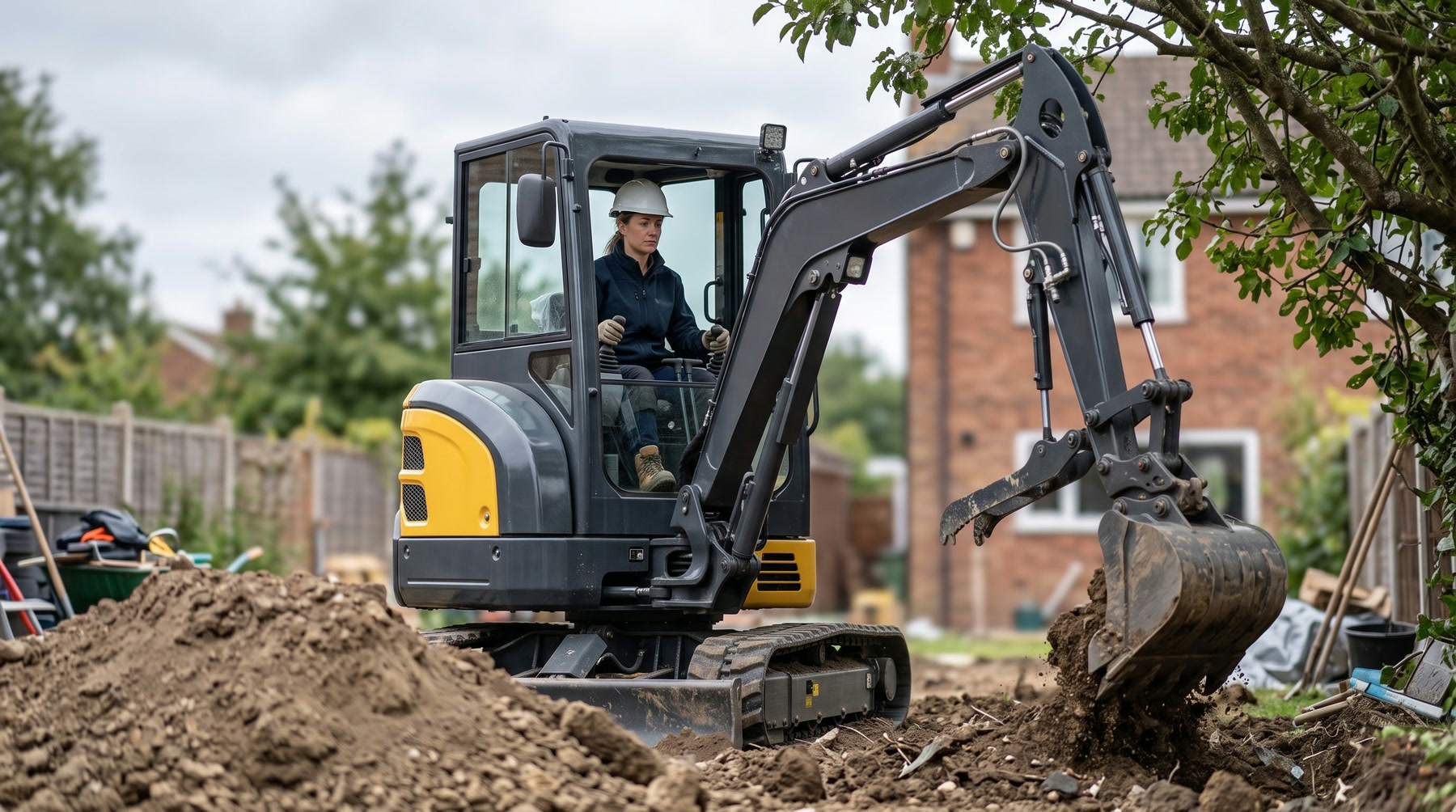 Operator working beside a TOUGHNEER excavator